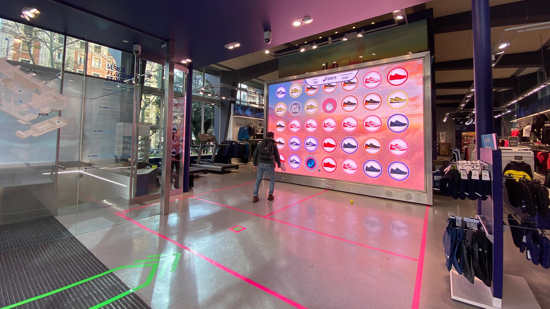 Person standing in front of MultiBall in the ASICS store