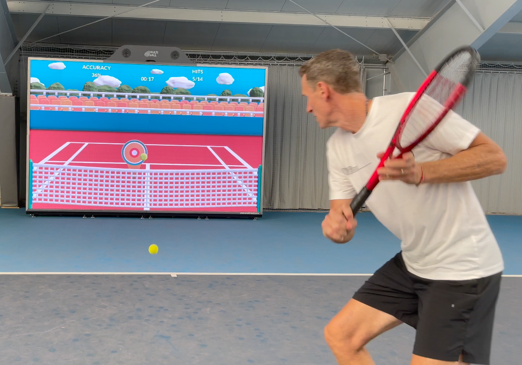 Man playing tennis on MultiBall