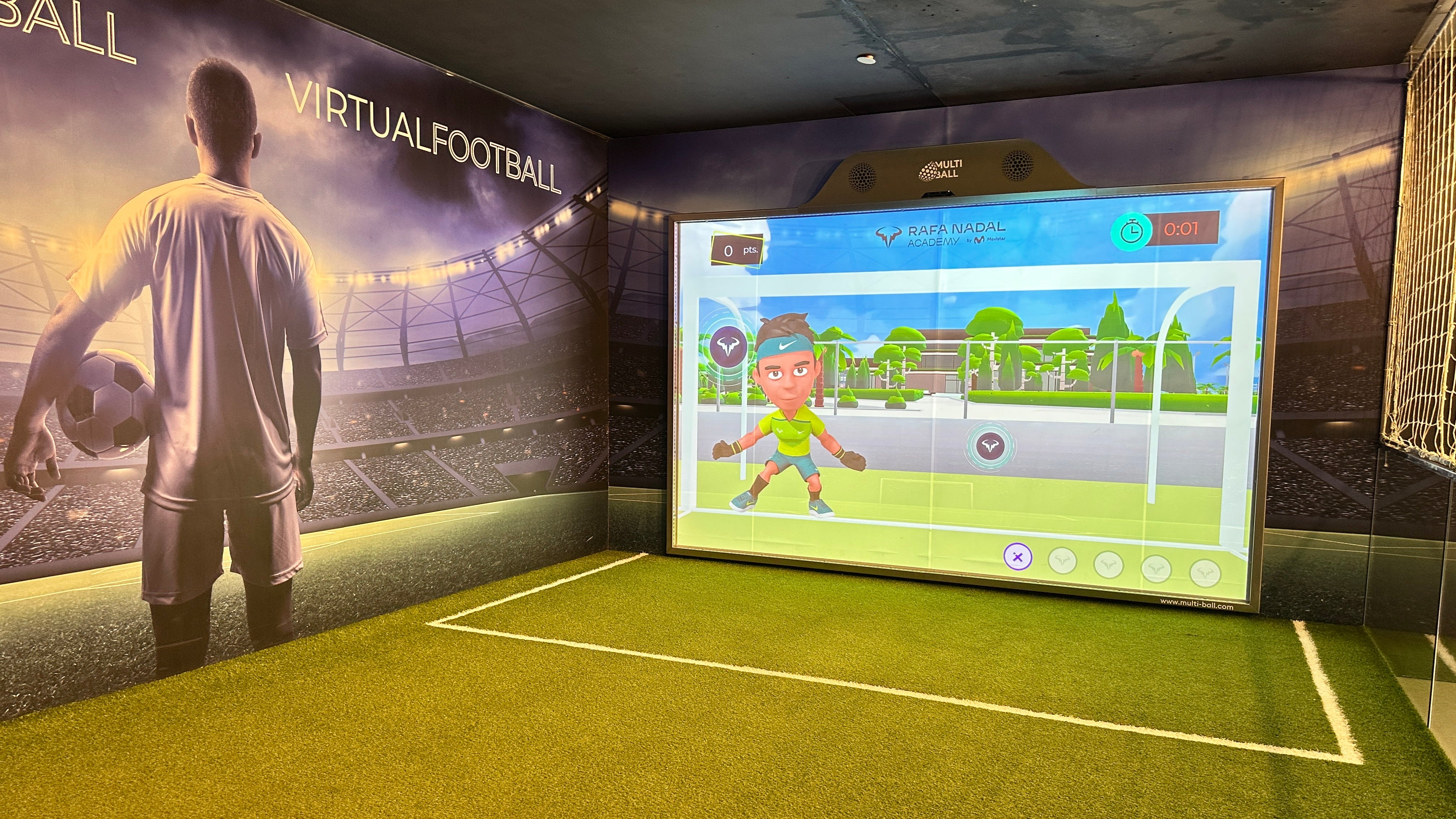 MultiBall at the Rafael Nadal Academy, indoors with a fake gras floor