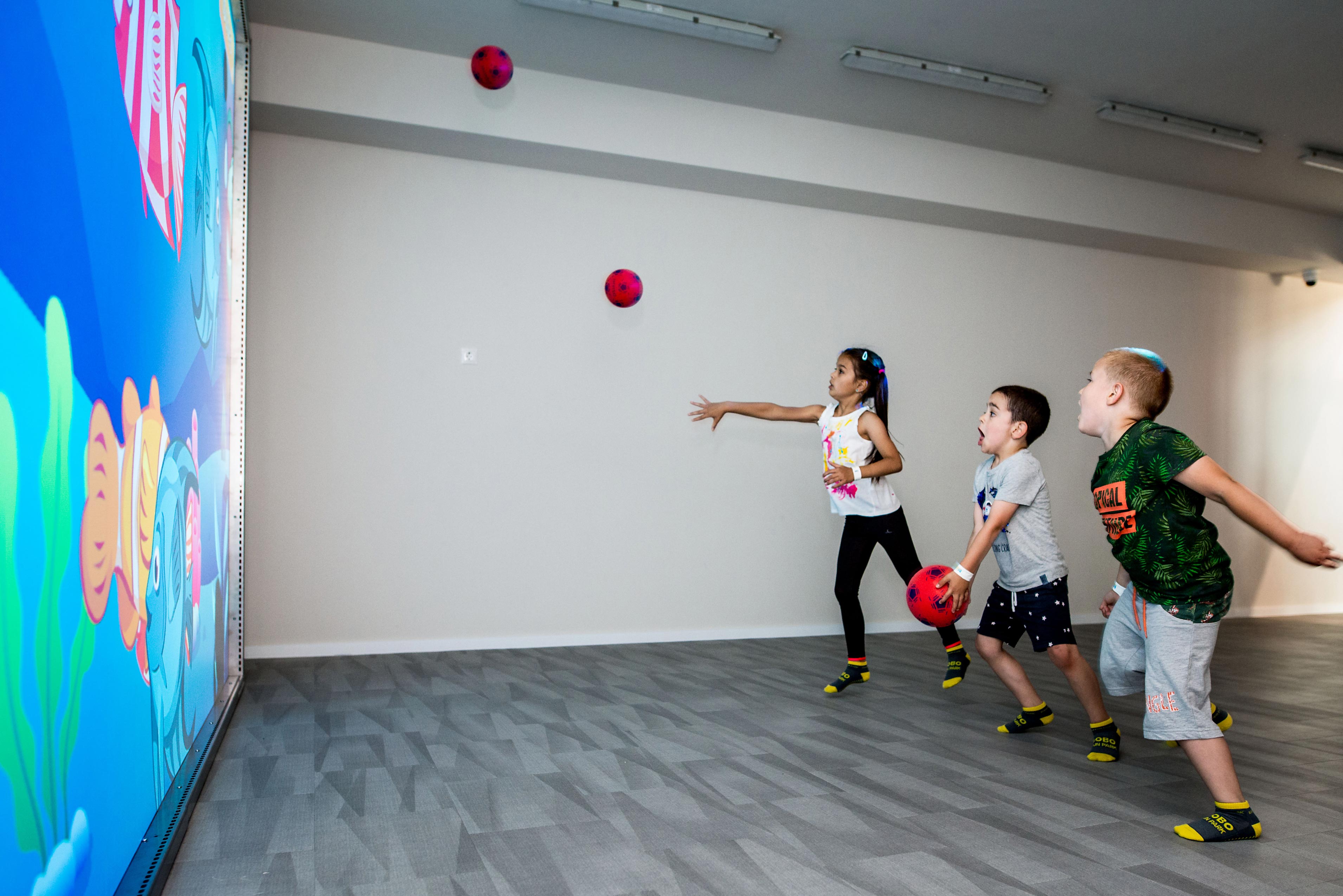 Children throwing balls at the MultiBall in the family entertainment Bobo Fun Park
