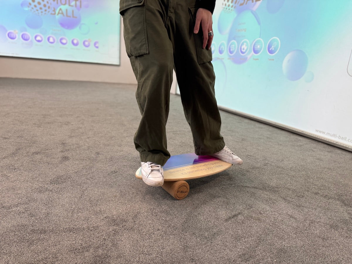 A person standing on the LYMB.iO board