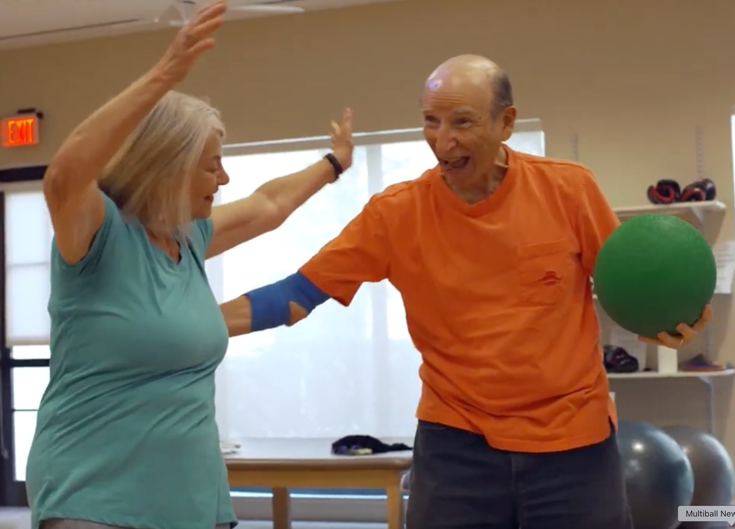 Two Seniors celebrating their success from playing MultiBall