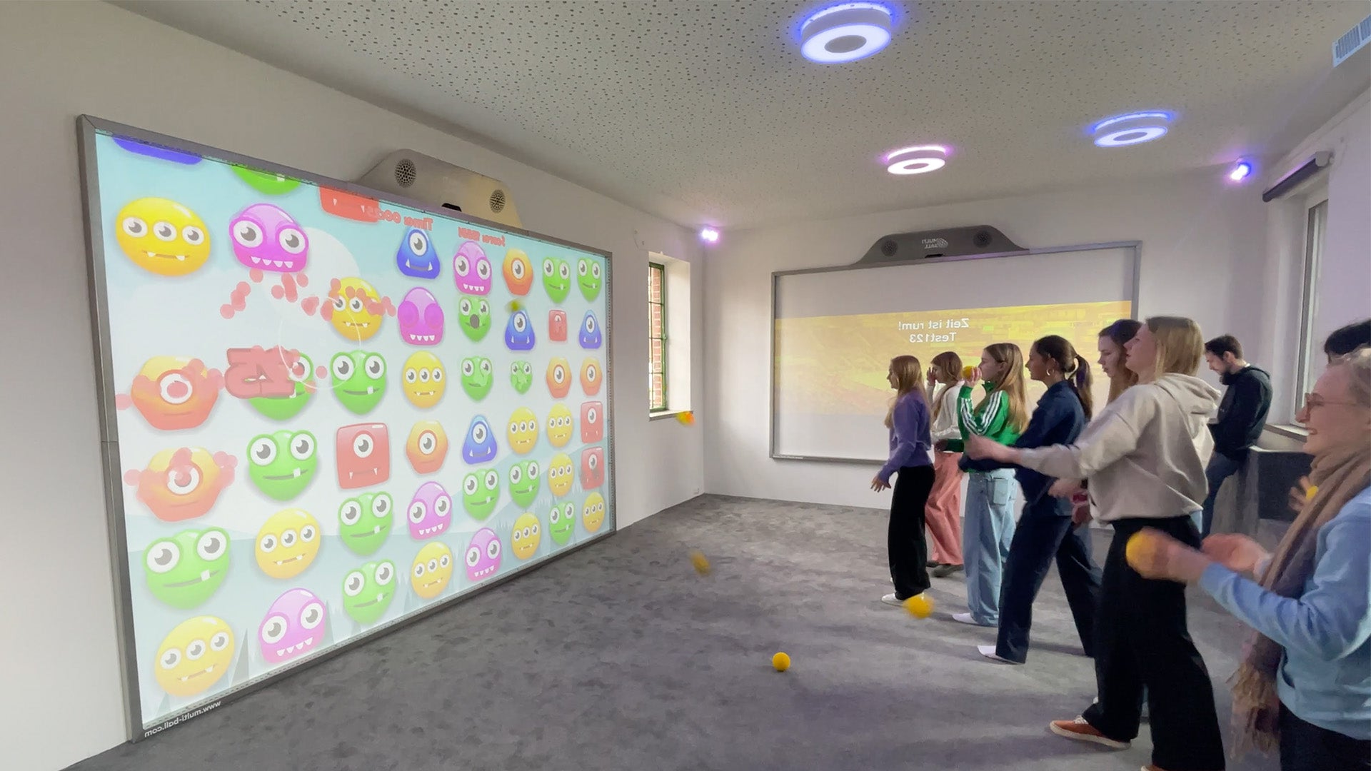 A group of girls playing the game Monster Match on the MultiBall Club