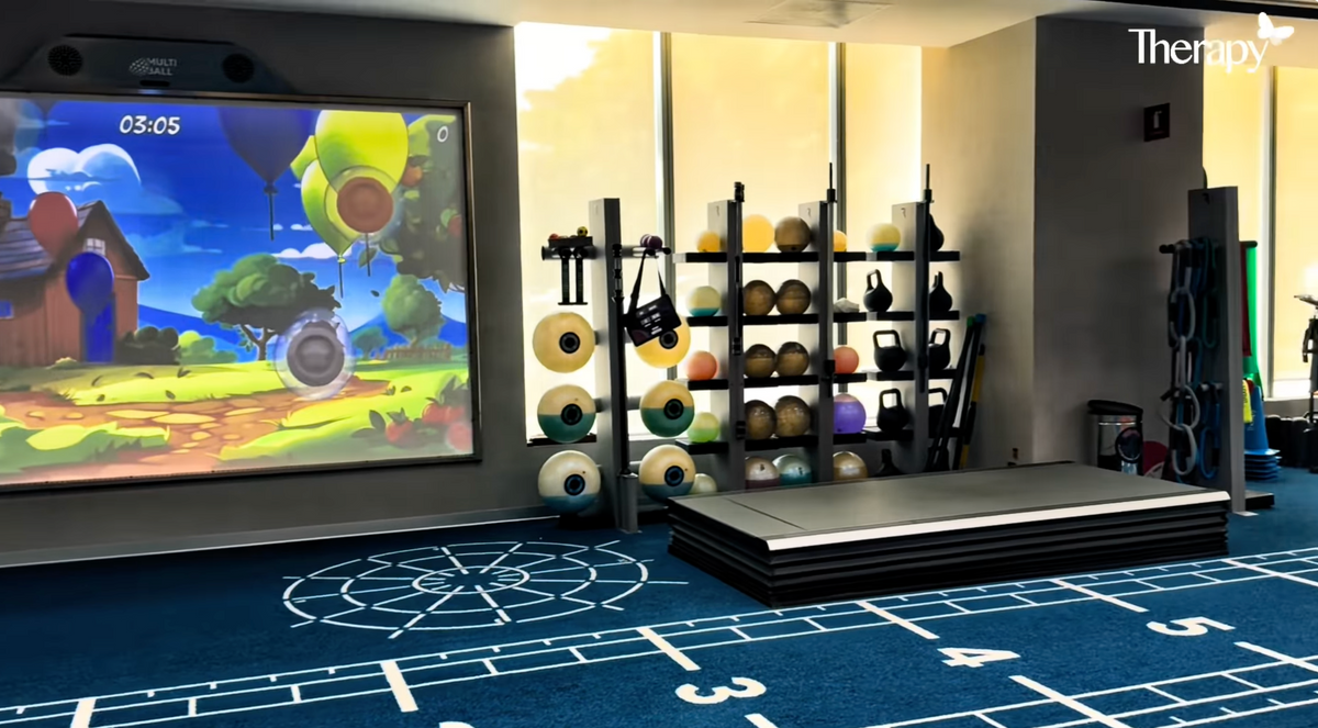MultiBall used for sports therapy with the MultiBall on the left and balls, plus weights on the right at Centro de Terapia Física y Rehabilitación, Hospital Angeles