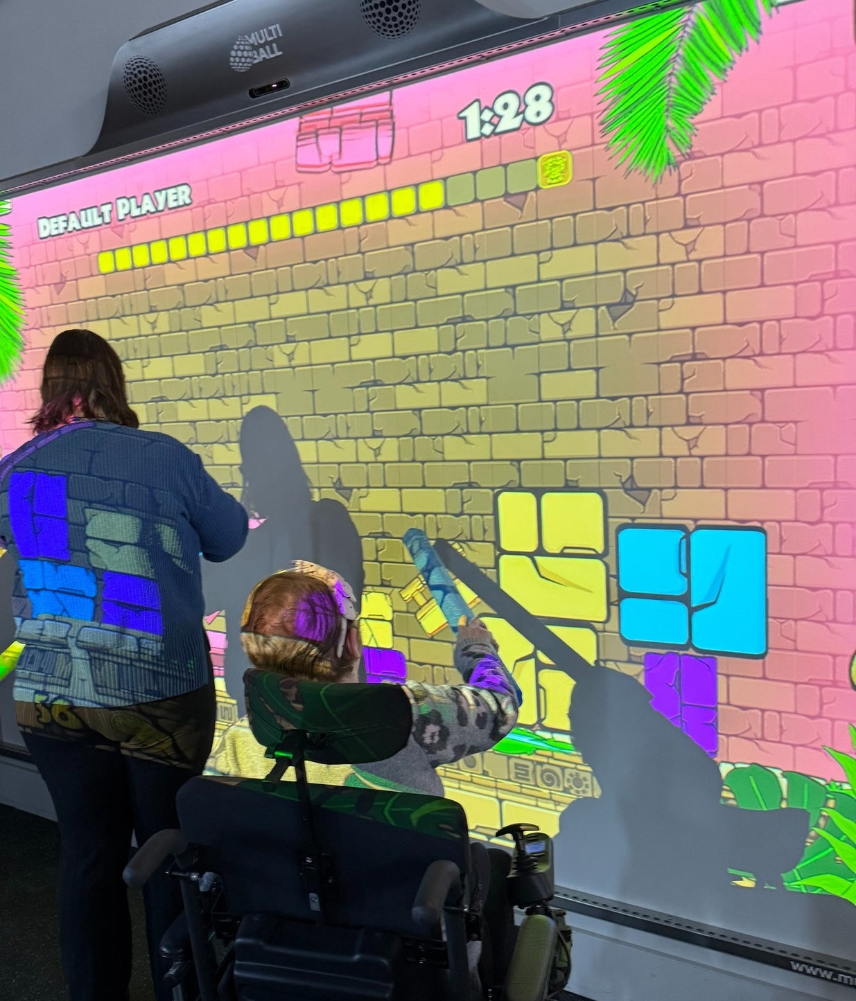People with disabilities playing MultiBall to improve movement at SaskAbilities in Canada