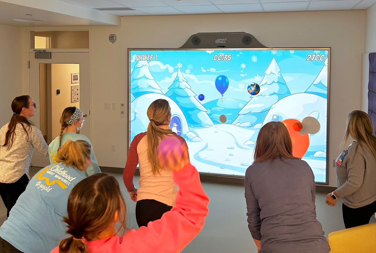Doctors, therapists and patients at Cincinnati Children's Hospital playing on MultiBall