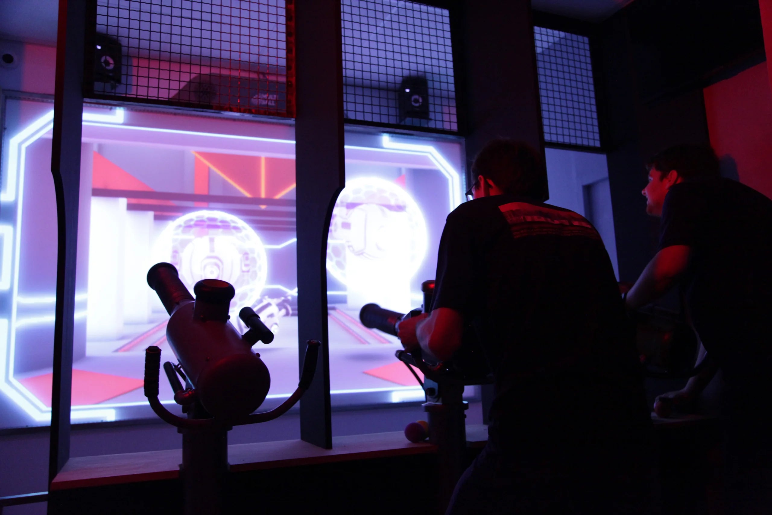 People playing with ball launchers the custom game Eclipsium Drone Defense on the MultiBall